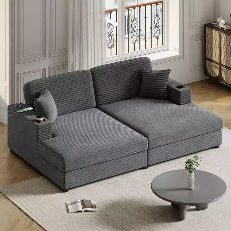 Divano componibile oversize da 220 cm con chaise longue, porte USB e portabicchieri