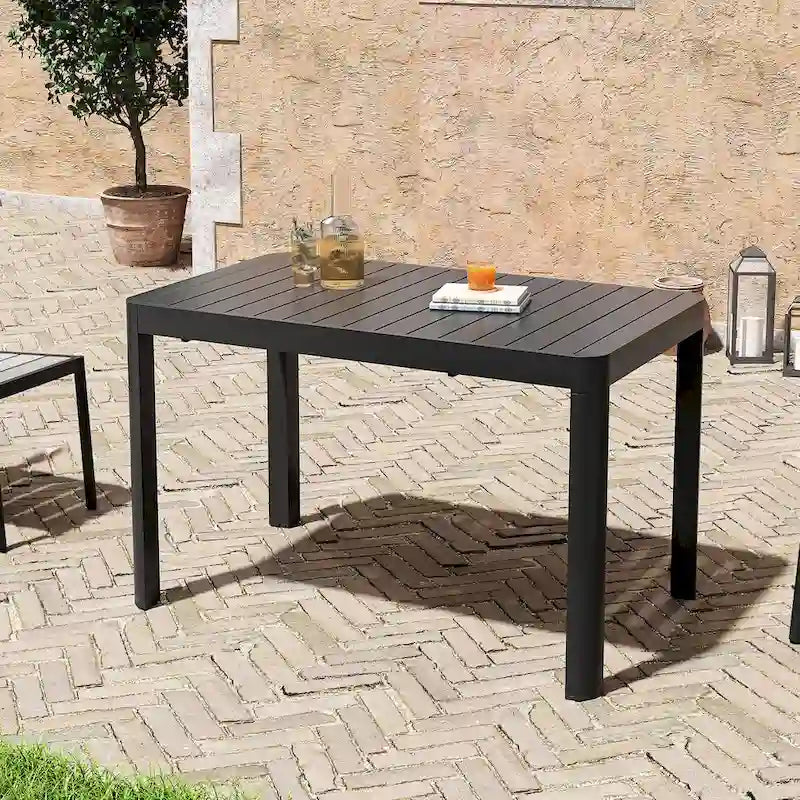 Set da pranzo per esterni a 5/7 posti con sedie impilabili e tavolo allungabile in alluminio