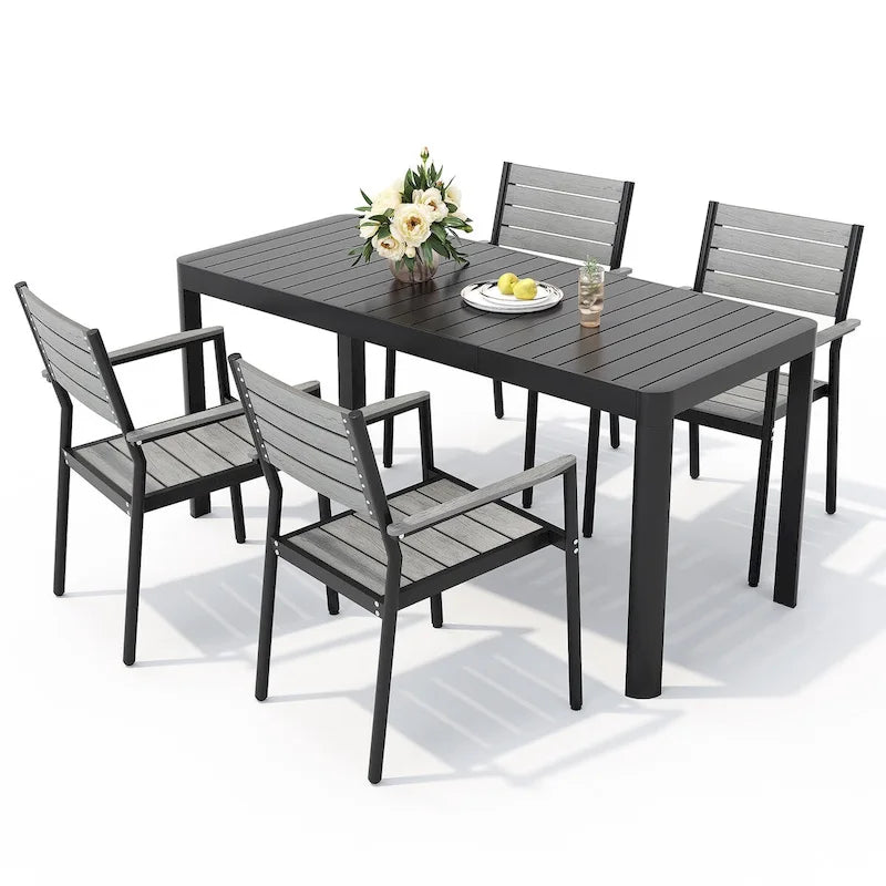 Set da pranzo per esterni a 5/7 posti con sedie impilabili e tavolo allungabile in alluminio