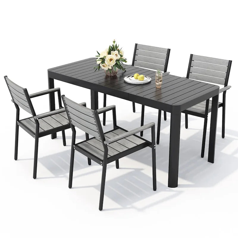 Set da pranzo per esterni a 5/7 posti con sedie impilabili e tavolo allungabile in alluminio