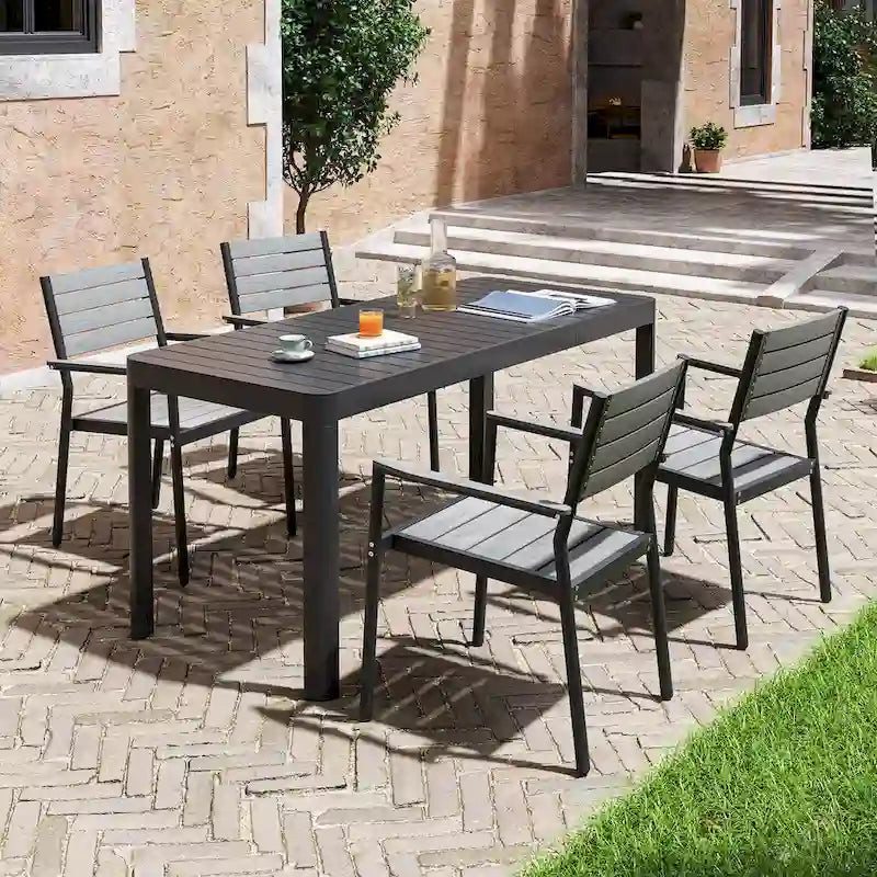 Set da pranzo per esterni a 5/7 posti con sedie impilabili e tavolo allungabile in alluminio